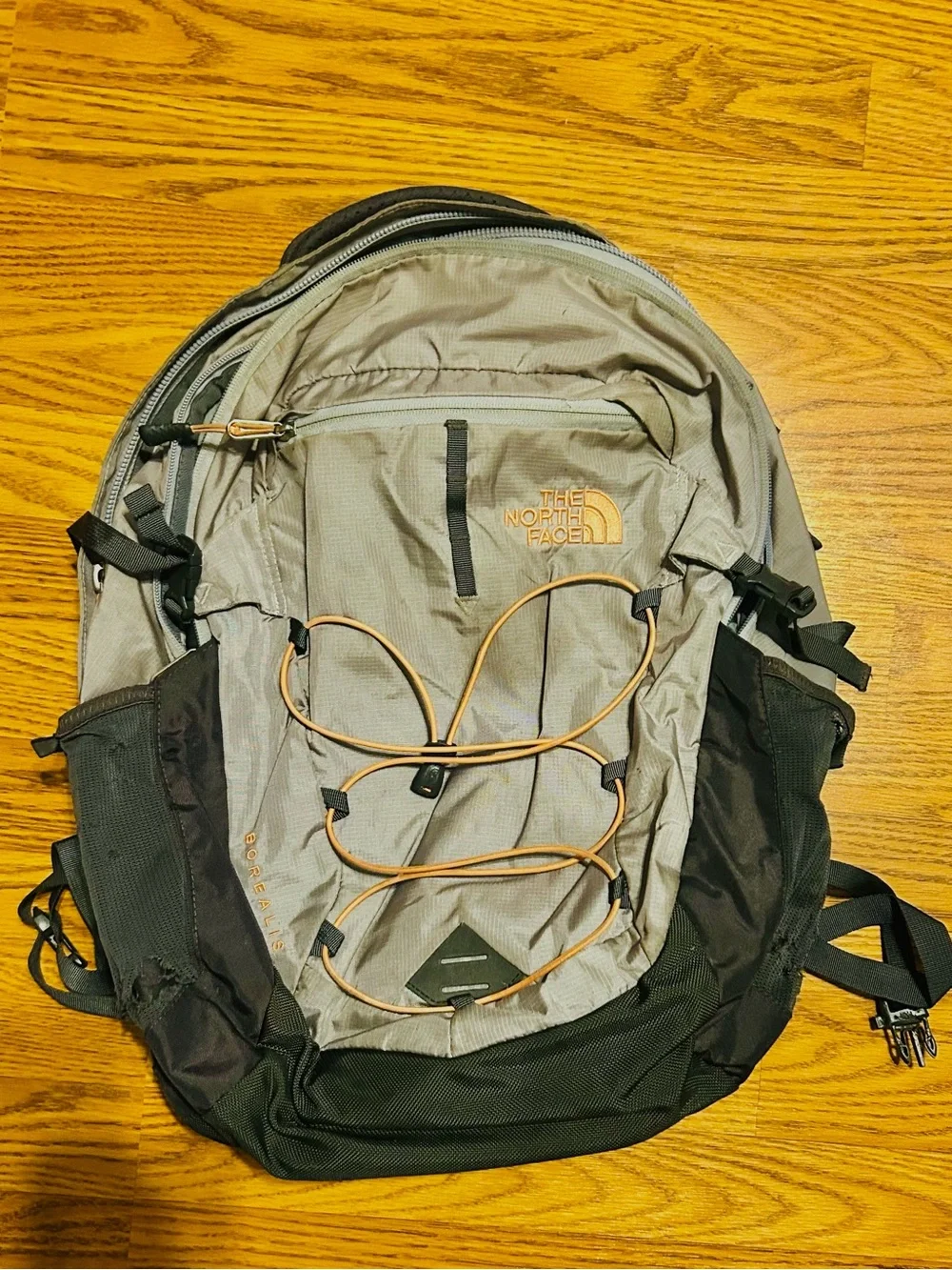 The North Face Gray and Black Backpack with Orange Accents